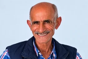 Sıcak Gülümsemeli Yaşlı Adam Portresi